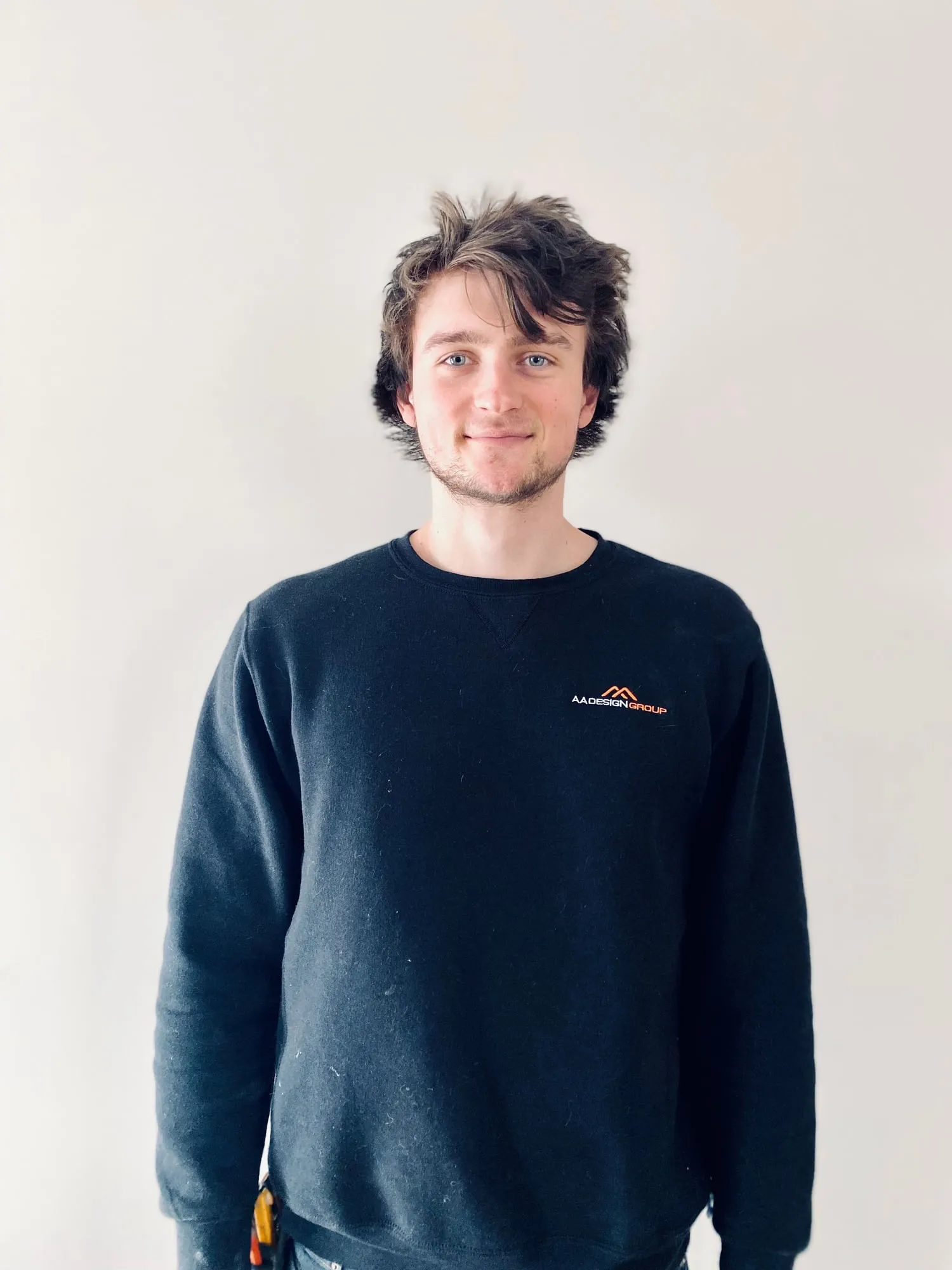 Alex Aptovcov in an AA Design Group sweatshirt